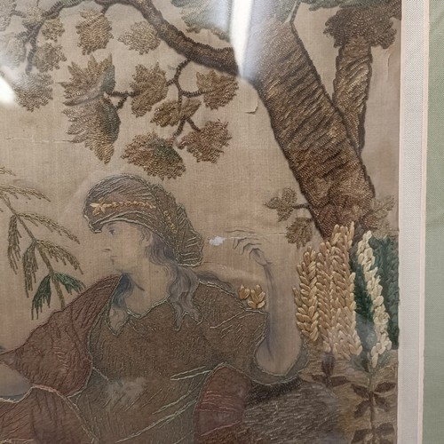 135 - A Regency silk embroidered panel, decorated figures and an angel, 28 x 40 cm