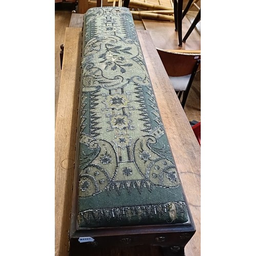 103 - A 19th century footstool, with a beadwork top, 124 cm wide