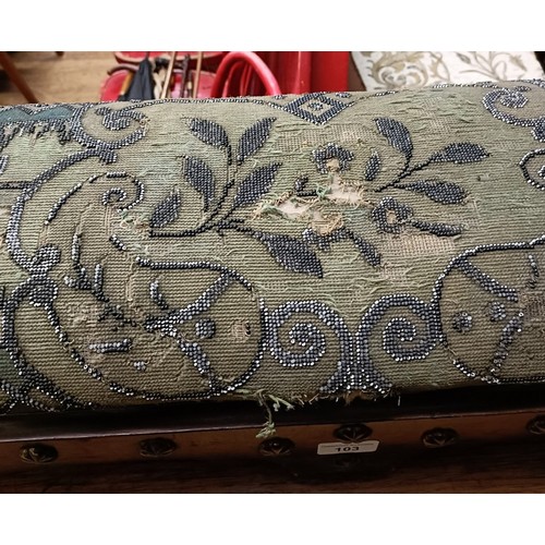 103 - A 19th century footstool, with a beadwork top, 124 cm wide