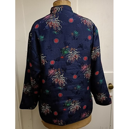 101 - A ladies Japanese embroidered jacket, decorated blossoms, size XXL, a black and white sequin top, an... 