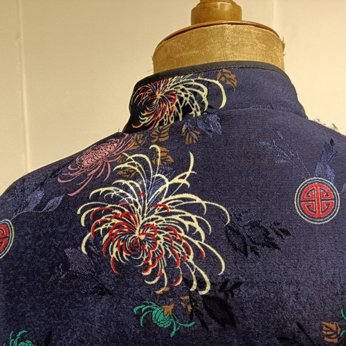 101 - A ladies Japanese embroidered jacket, decorated blossoms, size XXL, a black and white sequin top, an... 