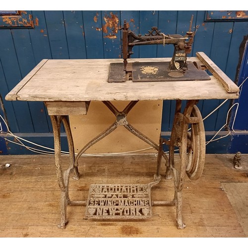 88 - A R Maquaire 2 sewing machine, on an iron treadle base, barn stored, 63 cm wide Provenance:  A singl... 