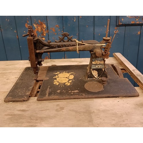 88 - A R Maquaire 2 sewing machine, on an iron treadle base, barn stored, 63 cm wide Provenance:  A singl... 