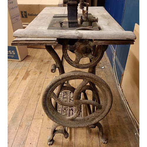 88 - A R Maquaire 2 sewing machine, on an iron treadle base, barn stored, 63 cm wide Provenance:  A singl... 