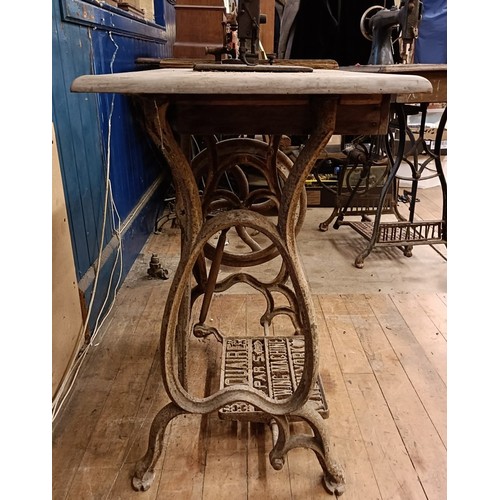 88 - A R Maquaire 2 sewing machine, on an iron treadle base, barn stored, 63 cm wide Provenance:  A singl... 