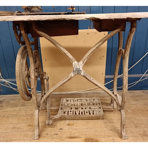 88 - A R Maquaire 2 sewing machine, on an iron treadle base, barn stored, 63 cm wide Provenance:  A singl... 