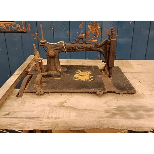 88 - A R Maquaire 2 sewing machine, on an iron treadle base, barn stored, 63 cm wide Provenance:  A singl... 