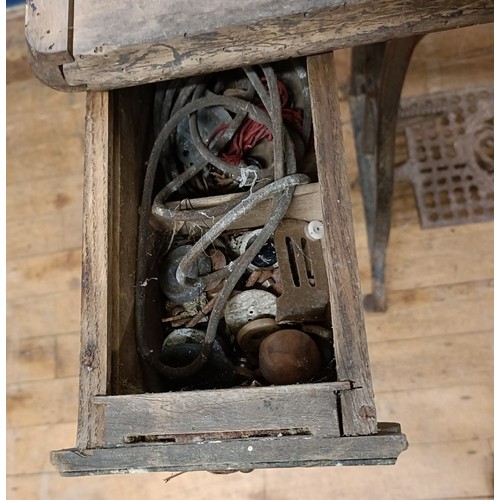 87 - A Liscot sewing machine, on an iron treadle base, barn stored , 90 cm wide Provenance:  A single own... 