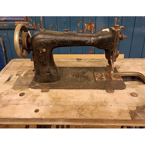 87 - A Liscot sewing machine, on an iron treadle base, barn stored , 90 cm wide Provenance:  A single own... 