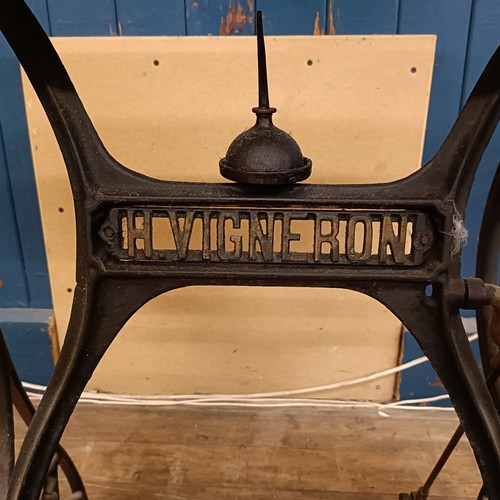 84 - An H Vigneron sewing machine, on an iron treadle base, 80 cm wide Provenance:  A single owner collec... 