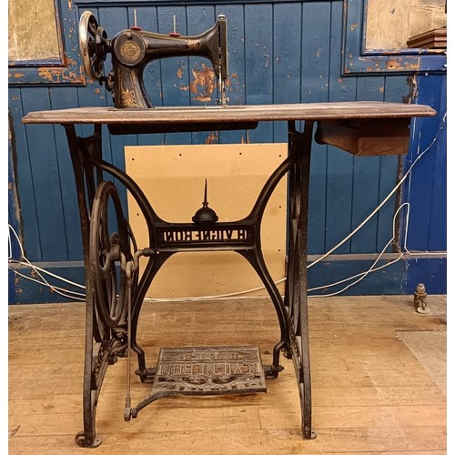 84 - An H Vigneron sewing machine, on an iron treadle base, 80 cm wide Provenance:  A single owner collec... 