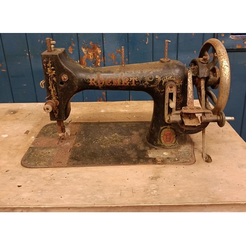 83 - A C Marque De Fabrique Rochet sewing machine, on an iron treadle base, barn stored, 74 cm wide Prove... 