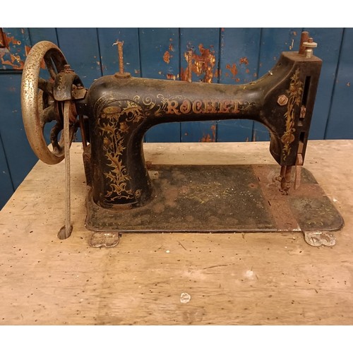 83 - A C Marque De Fabrique Rochet sewing machine, on an iron treadle base, barn stored, 74 cm wide Prove... 