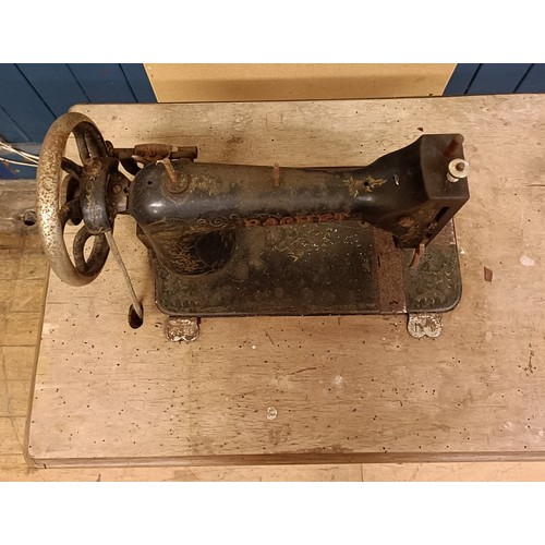 83 - A C Marque De Fabrique Rochet sewing machine, on an iron treadle base, barn stored, 74 cm wide Prove... 