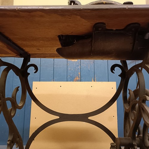 82 - A Peugeot Audincourt sewing machine, on an iron treadle base, 80 cm wide Provenance:  A single owner... 