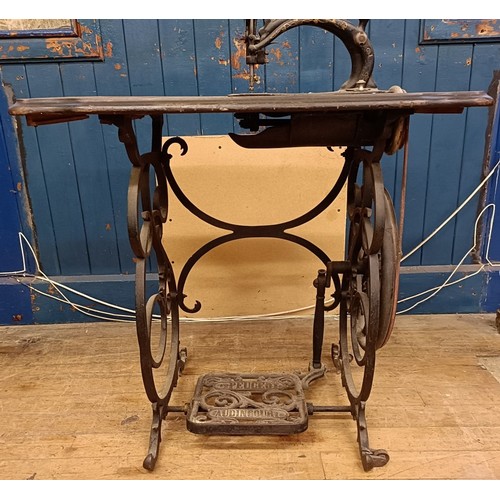 82 - A Peugeot Audincourt sewing machine, on an iron treadle base, 80 cm wide Provenance:  A single owner... 