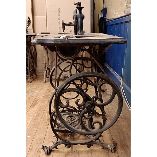 82 - A Peugeot Audincourt sewing machine, on an iron treadle base, 80 cm wide Provenance:  A single owner... 