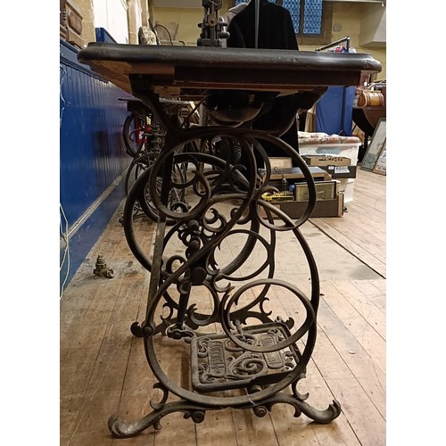 82 - A Peugeot Audincourt sewing machine, on an iron treadle base, 80 cm wide Provenance:  A single owner... 