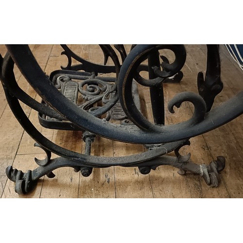 82 - A Peugeot Audincourt sewing machine, on an iron treadle base, 80 cm wide Provenance:  A single owner... 