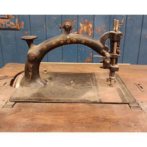 82 - A Peugeot Audincourt sewing machine, on an iron treadle base, 80 cm wide Provenance:  A single owner... 