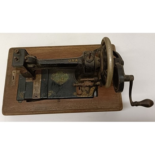 86 - An American White Sewing Machine Company sewing machine, lacking wooden case, 44 cm wide Provenance:... 