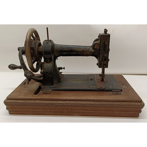 86 - An American White Sewing Machine Company sewing machine, lacking wooden case, 44 cm wide Provenance:... 