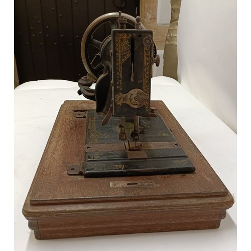 86 - An American White Sewing Machine Company sewing machine, lacking wooden case, 44 cm wide Provenance:... 