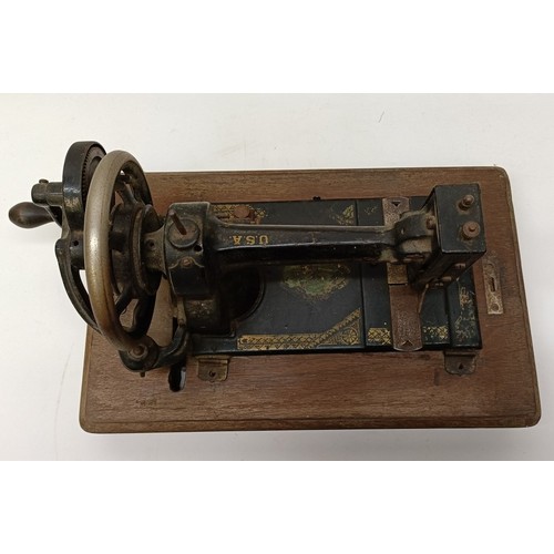 86 - An American White Sewing Machine Company sewing machine, lacking wooden case, 44 cm wide Provenance:... 