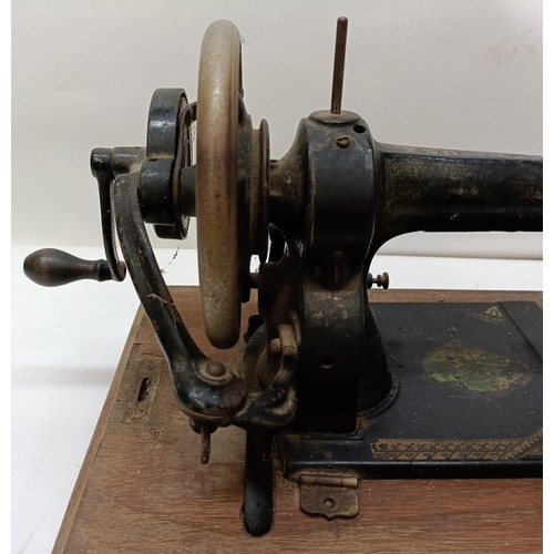 86 - An American White Sewing Machine Company sewing machine, lacking wooden case, 44 cm wide Provenance:... 