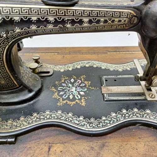 85 - A late 19th/early 20th century sewing machine, lacking wooden case, 50 cm wideProvenance:  A single ... 