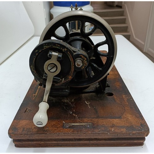 85 - A late 19th/early 20th century sewing machine, lacking wooden case, 50 cm wideProvenance:  A single ... 