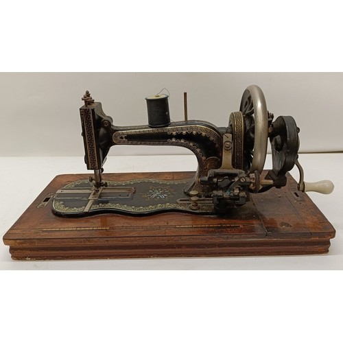 85 - A late 19th/early 20th century sewing machine, lacking wooden case, 50 cm wideProvenance:  A single ... 