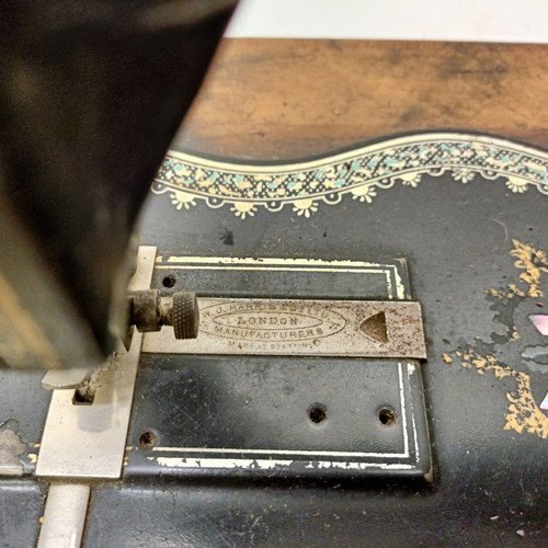 85 - A late 19th/early 20th century sewing machine, lacking wooden case, 50 cm wideProvenance:  A single ... 