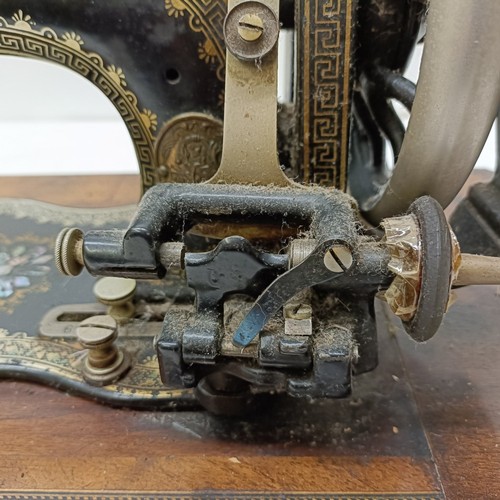 85 - A late 19th/early 20th century sewing machine, lacking wooden case, 50 cm wideProvenance:  A single ... 