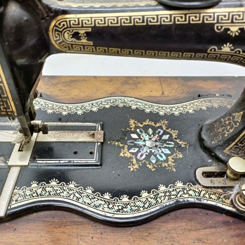 85 - A late 19th/early 20th century sewing machine, lacking wooden case, 50 cm wideProvenance:  A single ... 