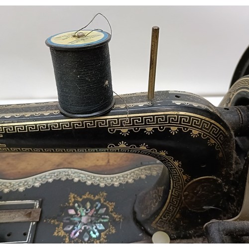 85 - A late 19th/early 20th century sewing machine, lacking wooden case, 50 cm wideProvenance:  A single ... 