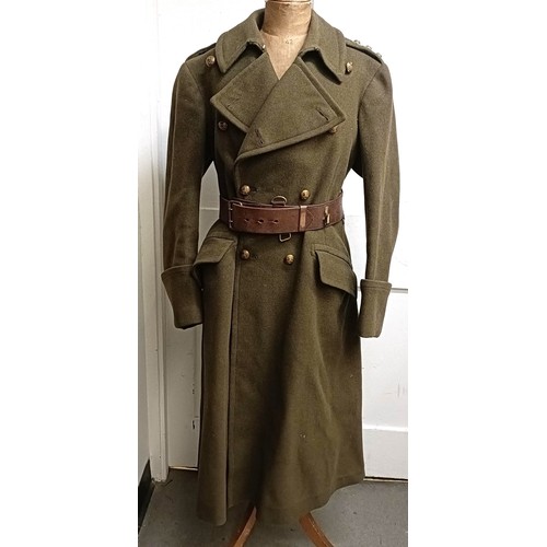 38 - A military coat, a leather belt and assorted military hats (box) Provenance:  A single owner collect... 