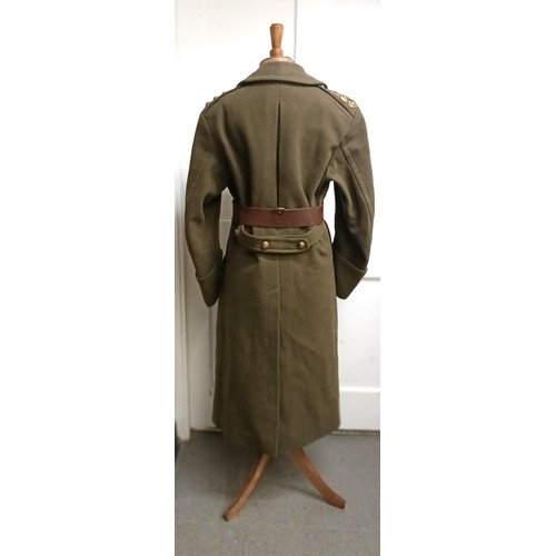 38 - A military coat, a leather belt and assorted military hats (box) Provenance:  A single owner collect... 