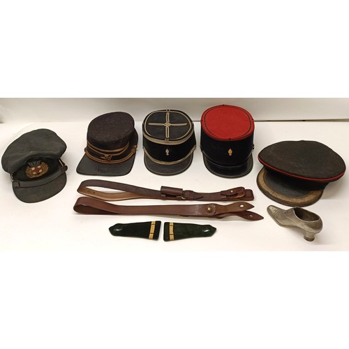 38 - A military coat, a leather belt and assorted military hats (box) Provenance:  A single owner collect... 