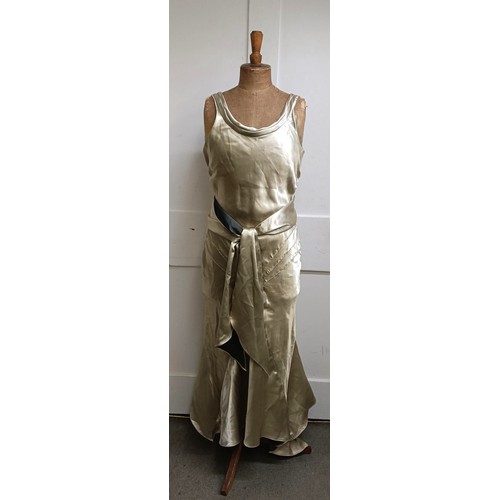 42 - A satin evening gown, with a bodice (box) Provenance:  A single owner collection, from the studio of... 