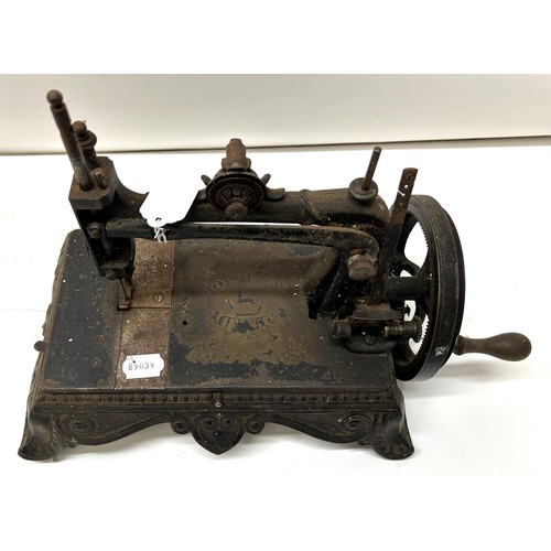 72 - A 19th century sewing machine, 30 cm wide Provenance:  A single owner collection, from the stud... 