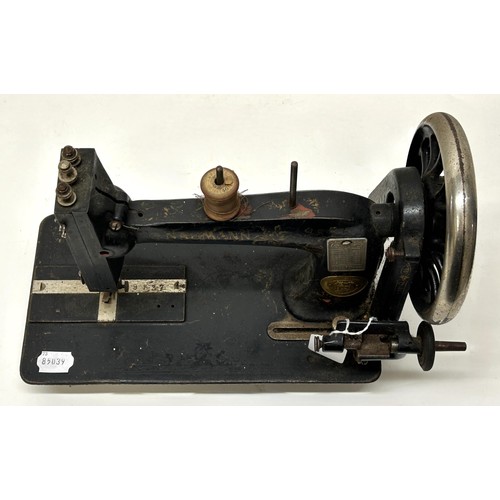 73 - A Naumann sewing machine, 32 cm wide Provenance:  A single owner collection, from the studio of... 