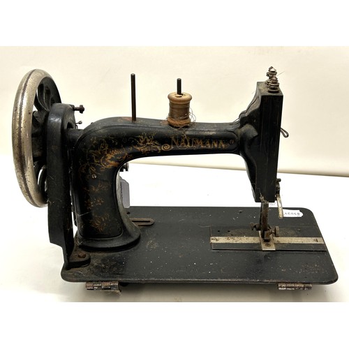 73 - A Naumann sewing machine, 32 cm wide Provenance:  A single owner collection, from the studio of... 