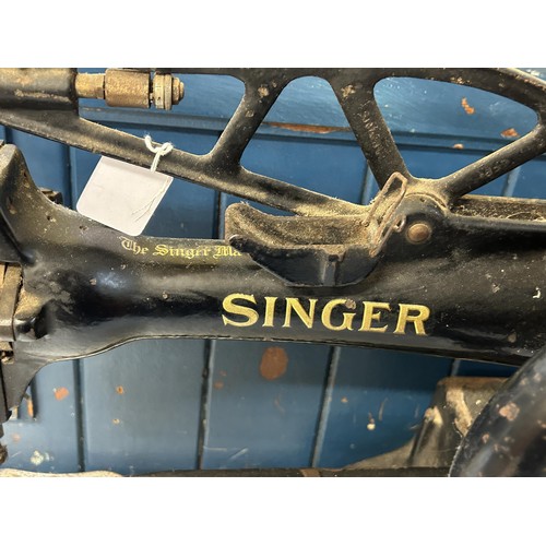 74 - An industrial Singer sewing machine, 65 cm wide Provenance:  A single owner collection, from th... 