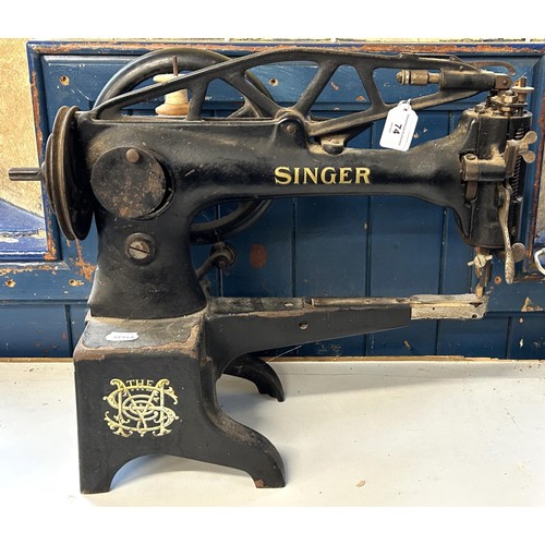 74 - An industrial Singer sewing machine, 65 cm wide Provenance:  A single owner collection, from th... 