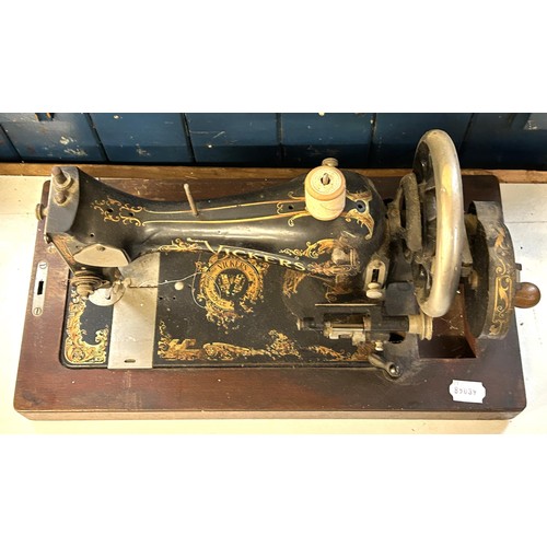 75 - A Vickers sewing machine, lacking wooden case, 48 cm wide Provenance:  A single owner collectio... 