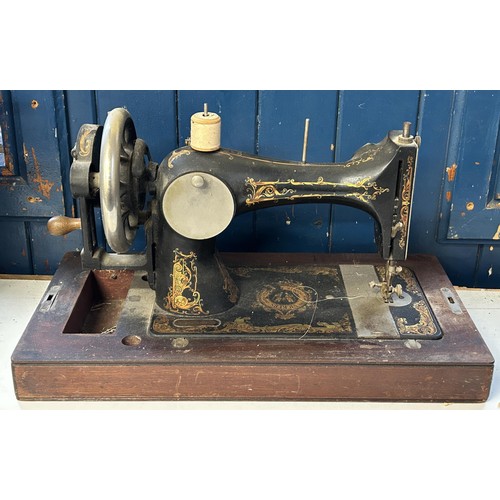 75 - A Vickers sewing machine, lacking wooden case, 48 cm wide Provenance:  A single owner collectio... 