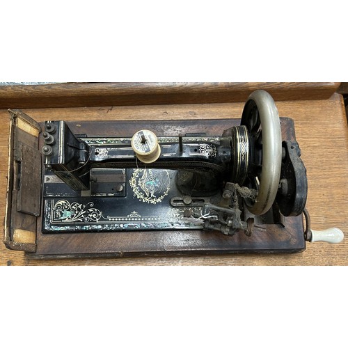 79 - A late 19th/early 20th century sewing machine, lacking wooden case, 48 cm wide Provenance:  A s... 