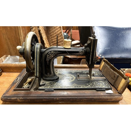 79 - A late 19th/early 20th century sewing machine, lacking wooden case, 48 cm wide Provenance:  A s... 