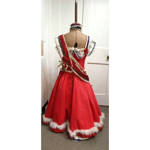 49 - A vintage adjustable dress maker's mannequin, with a dress in French coloursProvenance:  A single ow... 